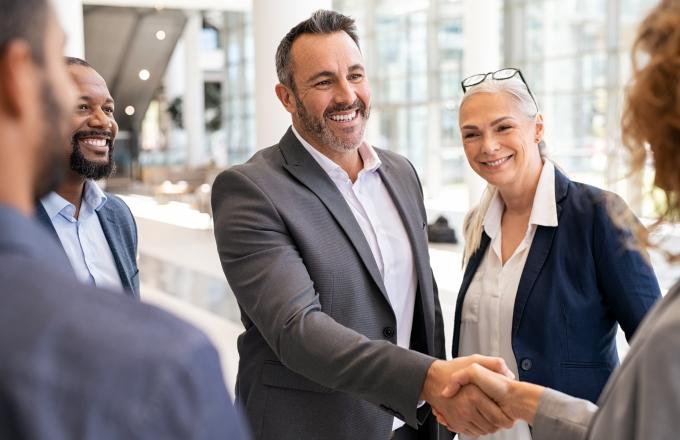 Producer Central Compliance Experts Handshake