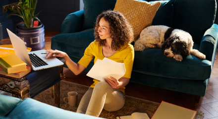 Woman at home with dog