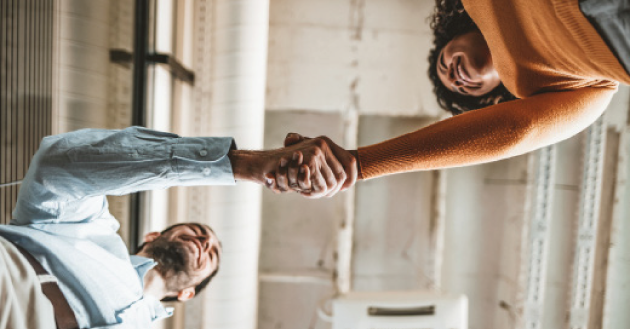 Two people shaking hands